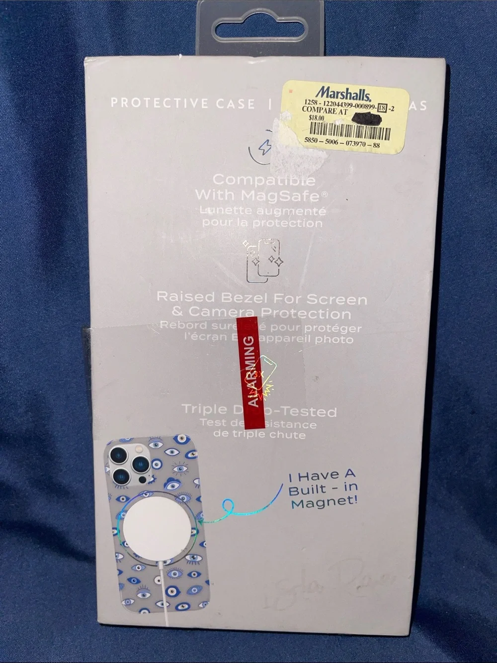 Isla Rae Clear iPhone Case with Blue Eye Pattern and White MagSafe Ring